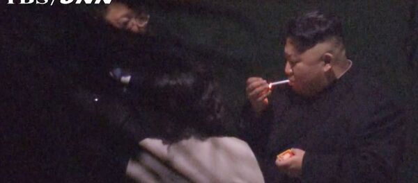 In this image made from Japan’s TBS TV video on early Tuesday, Feb. 26, 2019, North Korean leader Kim Jong Un, a habitual smoker, takes a pre-dawn smoke break at the train station in Nanning, China, hours before his arrival in Vietnam for his high-stakes summit with President Donald Trump over resolving the international standoff over the North’s nuclear weapons and missiles In this image made from Japan’s TBS TV video on early Tuesday, Feb. 26, 2019, North Korean leader Kim Jong Un, a habitual smoker, takes a pre-dawn smoke break at the train station in Nanning, China, hours before his arrival in Vietnam for his high-stakes summit with President Donald Trump over resolving the international standoff over the North’s nuclear weapons and missiles - Sputnik International