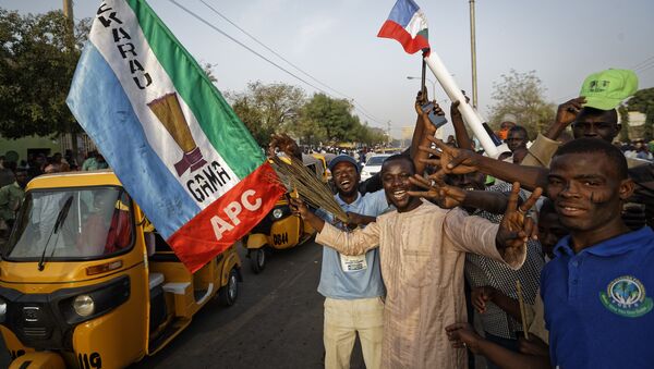 Supporters of President Buhari's ruling APC party celebrate results from the Nigerian elections on 25 February 2019 - Sputnik International