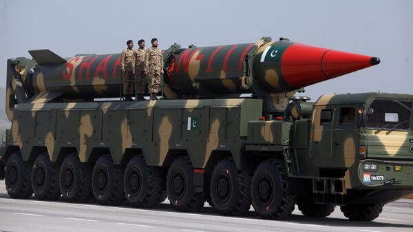 A Pakistani-made Shaheen-III missile, that is capable of carrying nuclear warheads, is on display during a military parade in Islamabad, Pakistan, Friday, March 23, 2018 - Sputnik International