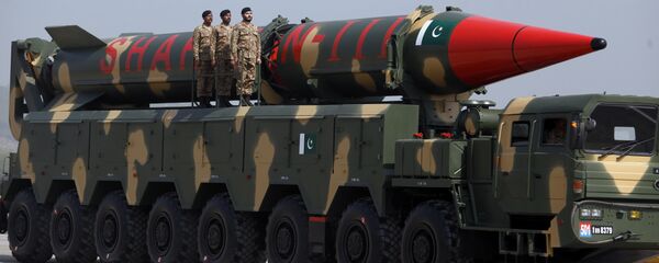 A Pakistani-made Shaheen-III missile, that is capable of carrying nuclear warheads, is on display during a military parade in Islamabad, Pakistan, Friday, March 23, 2018 - Sputnik International