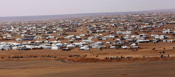 This picture taken Tuesday, Feb. 14, 2017, shows an ariel view of the informal Rukban camp, between the Jordan and Syria borders. - Sputnik International