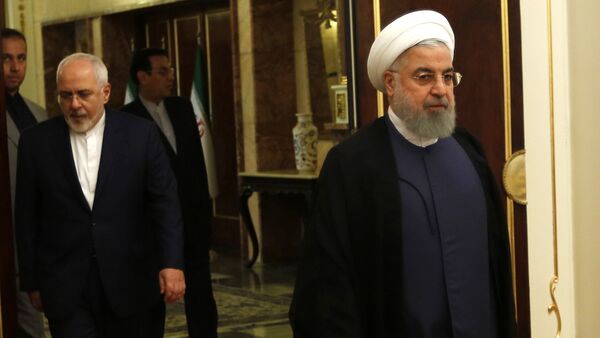 Iranian President Hassan Rouhani arrives to a meeting with the North Korean foreign minister in the capital Tehran on August 8, 2018 - Sputnik International