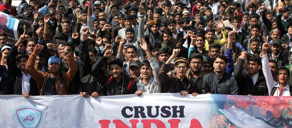Supporters of Jamiat Talaba Islam (JTI), student wing of religious and political party Jamaat-e-Islami (JI), chant slogans as they celebrate, after Pakistan shot down two Indian military aircrafts, in Lahore, Pakistan February 27, 2019 Supporters of Jamiat Talaba Islam (JTI), student wing of religious and political party Jamaat-e-Islami (JI), chant slogans as they celebrate, after Pakistan shot down two Indian military aircrafts, in Lahore, Pakistan February 27, 2019 - Sputnik International