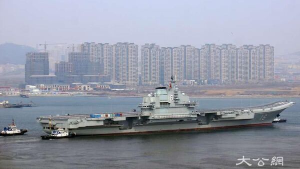 China's aircraft carrier Liaoning departs from the shipyards at Dalian, Liaoning, on February 24, 2019, following a six-month superstructure retrofit - Sputnik International