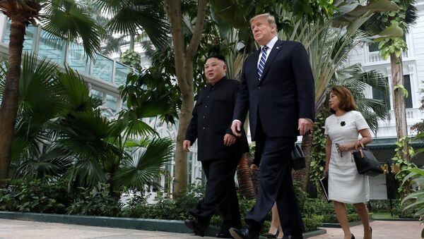 North Korea's leader Kim Jong Un and U.S. President Donald Trump walk in the garden of the Metropole hotel during the second North Korea-U.S. summit in Hanoi, Vietnam February 28, 2019 - Sputnik International