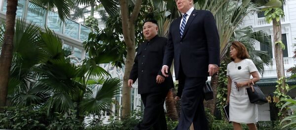North Korea's leader Kim Jong Un and U.S. President Donald Trump walk in the garden of the Metropole hotel during the second North Korea-U.S. summit in Hanoi, Vietnam February 28, 2019 - Sputnik International