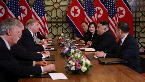 North Korea's leader Kim Jong Un speaks with U.S. President Donald Trump at the extended bilateral meeting in the Metropole hotel during the second North Korea-U.S. summit in Hanoi, Vietnam February 28, 2019 - Sputnik International