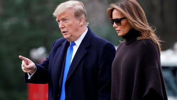 U.S. President Donald Trump and U.S. first lady Melania Trump walk to Marine One as they depart for Palm Beach from the White House in Washington, U.S., February 15, 2019 - Sputnik International