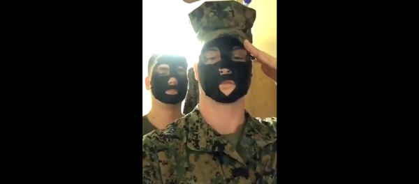 US Marines investigated after video surfaces, showing the pair posing in blackface - Sputnik International