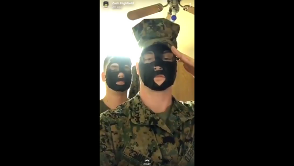 US Marines investigated after video surfaces, showing the pair posing in blackface - Sputnik International