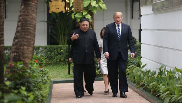 North Korea's leader Kim Jong Un and U.S. President Donald Trump talk in the garden of the Metropole hotel during the second North Korea-U.S. summit in Hanoi, Vietnam February 28, 2019 - Sputnik International
