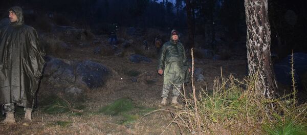 Pakistani soldiers and media personnel gather at the site where the Indian Air Force (IAF) strike launched on a Jaish-e-Mohammad (JeM) camp at Balakot on February 26, 2019 - Sputnik International
