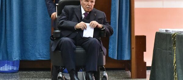 (FILES) In this file photo taken on May 04, 2017 Algerian President Abdelaziz Bouteflika is seen on a wheelchair as he votes at a polling station in Algiers. (FILES) In this file photo taken on May 04, 2017 Algerian President Abdelaziz Bouteflika is seen on a wheelchair as he votes at a polling station in Algiers. - Sputnik International