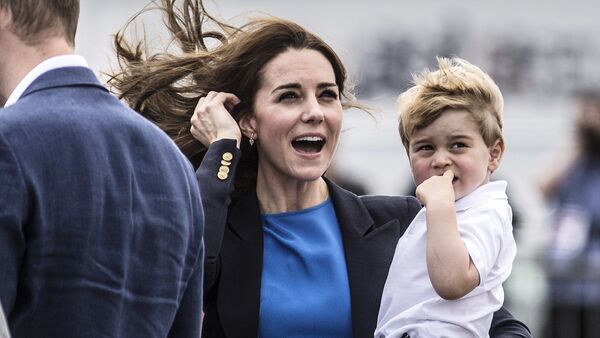 Kate, the Duchess of Cambridge, reacts to a low flying air display as she carries Prince George during a visit to the Royal International Air Tattoo at RAF Fairford in Gloucestershire, England, Friday July 8, 2016 - Sputnik International
