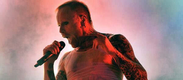 In this photo taken late Friday, Aug. 14, 2009 singer Keith Flint of the British band The Prodigy performs on Shipyard Island in Northern Budapest, Hungary, during the Island Festival, one of the biggest cultural events of Europe, offering art exhibitions, literary and theatre performances and music concerts by international and Hungarian performers. In this photo taken late Friday, Aug. 14, 2009 singer Keith Flint of the British band The Prodigy performs on Shipyard Island in Northern Budapest, Hungary, during the Island Festival, one of the biggest cultural events of Europe, offering art exhibitions, literary and theatre performances and music concerts by international and Hungarian performers. - Sputnik International