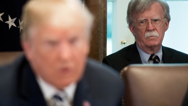 US President Donald Trump speaks alongside National Security Adviser John Bolton (R) during a Cabinet Meeting in the Cabinet Room of the White House in Washington, DC, May 9, 2018 - Sputnik International