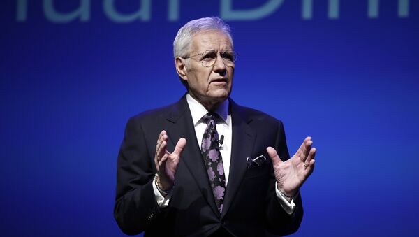 In this Oct. 1, 2018, photo, moderator Alex Trebek speaks during a gubernatorial debate between Democratic Gov. Tom Wolf and Republican Scott Wagner in Hershey, Pa. Jeopardy! host Trebek says he has been diagnosed with advanced -four pancreatic cancer. In a video posted online Wednesday, March 6, 2019, Trebek said he was announcing his illness directly to Jeopardy! fans in keeping with his long-time policy of being open and transparent. - Sputnik International