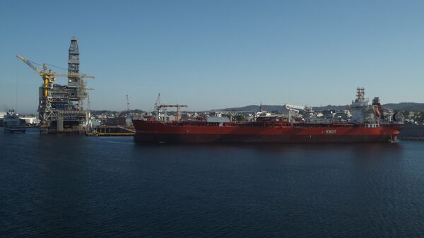 A KNOT oil tanker sails past a refinery in the Norwegian fjords. - Sputnik International