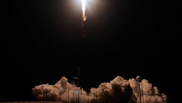 A SpaceX Falcon 9 rocket, carrying the Crew Dragon spacecraft, lifts off on an uncrewed test flight to the International Space Station from the Kennedy Space Center in Cape Canaveral, Florida, U.S., March 2, 2019 - Sputnik International