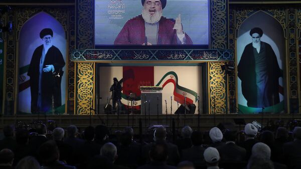 Hezbollah leader Sayyed Hassan Nasrallah delivers a live broadcast speech, during a rally to commemorate the 40th anniversary of Iran's Islamic Revolution, in southern Beirut, Lebanon, Wednesday, Feb. 6, 2019 - Sputnik International
