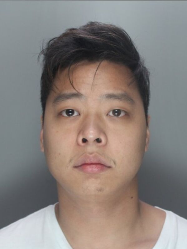 Jie Zheng (pictured) offered a Santander employee £500 a week if he would turn a blind eye to him paying in large sums of money to third party bank accounts Jie Zheng (pictured) offered a Santander employee £500 a week if he would turn a blind eye to him paying in large sums of money to third party bank accounts - Sputnik International