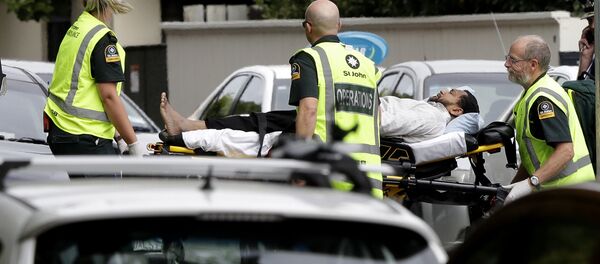 Ambulance staff take a man from outside a mosque in central Christchurch, New Zealand, Friday, Ambulance staff take a man from outside a mosque in central Christchurch, New Zealand, Friday, - Sputnik International