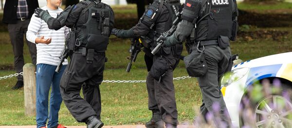 AOS (Armed Offenders Squad) push back members of the public following a shooting at the Masjid Al Noor mosque in Christchurch AOS (Armed Offenders Squad) push back members of the public following a shooting at the Masjid Al Noor mosque in Christchurch - Sputnik International