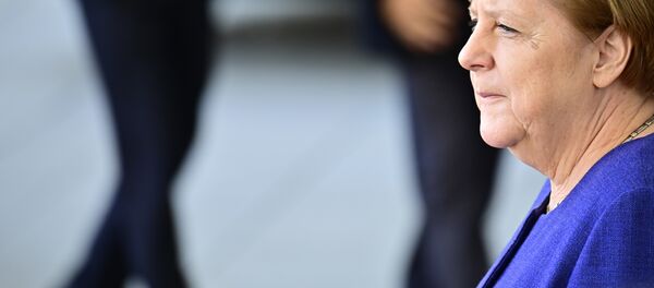 German Chancellor Angela Merkel waits for her guest, the Laotian Prime Minister, before a welcome ceremony and talks at the chancellery in Berlin on March 13, 2019 German Chancellor Angela Merkel waits for her guest, the Laotian Prime Minister, before a welcome ceremony and talks at the chancellery in Berlin on March 13, 2019 - Sputnik International