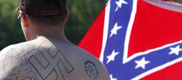 supporters of the US Confederate flag, expecting the Ku Klux Klan to show up, participate in a rally in Georgia supporters of the US Confederate flag, expecting the Ku Klux Klan to show up, participate in a rally in Georgia - Sputnik International