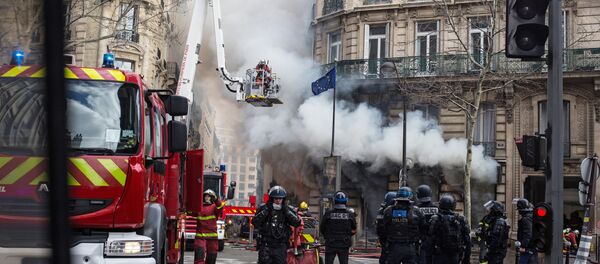 Yellow Vests protest in Paris on 16 March. - Sputnik International