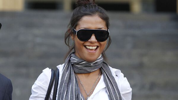 Imane Fadil smiles as she leaves court in Milan, Italy in 2011. Prosecutors have opened an investigation into the 2019 death of the Moroccan model who testified against ex-Premier Silvio Berlusconi - Sputnik International