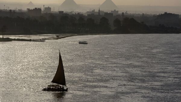 Holiday makers take a boat tour on the Nile River past the Great Pyramids, in Cairo, Egypt, Friday, Aug. 18, 2017.  - Sputnik International