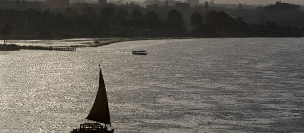 Holiday makers take a boat tour on the Nile River past the Great Pyramids, in Cairo, Egypt, Friday, Aug. 18, 2017.  - Sputnik International