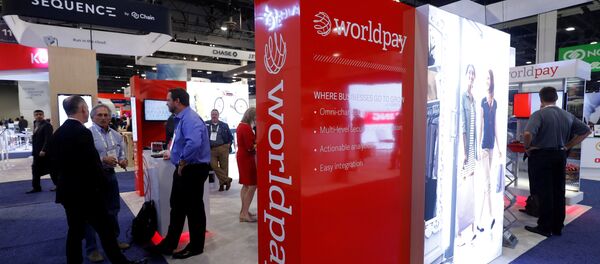 A Worldpay booth is shown on the exhibit hall floor during the Money 20/20 conference in Las Vegas A Worldpay booth is shown on the exhibit hall floor during the Money 20/20 conference in Las Vegas - Sputnik International