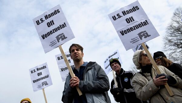 Activists rally against US intervention in Venezuela outside White House on January 26, 2019 in Washington, DC. - Sputnik International