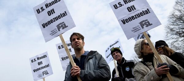 Activists rally against US intervention in Venezuela outside White House on January 26, 2019 in Washington, DC. - Sputnik International