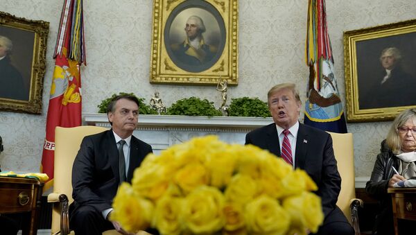 U.S. President Donald Trump speaks while meeting with Brazilian President Jair Bolsonaro in Oval Office of the White House in Washington, U.S., March 19, 2019. - Sputnik International