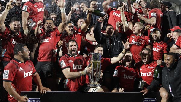Crusaders players celebrate with their trophy after defeating the Lions 37-18 to win Super Rugby final in Christchurch, New Zealand, Saturday, Aug. 4, 2018 - Sputnik International