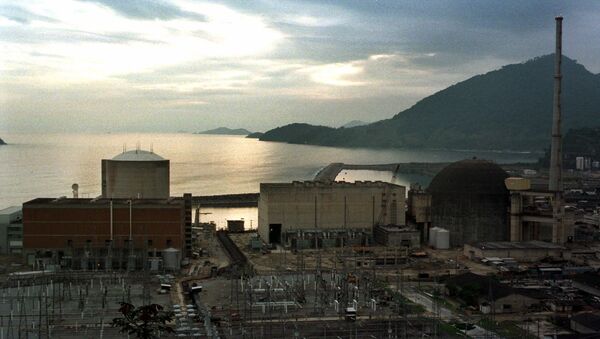 The Angra 2 nuclear reactor dome at right is seen in Angra dos Reis, Brazil, in this photo taken November 24, 1998. Delayed for more than a decade by cost overruns and safety concerns, the Angra 2 reactor at last will be finished. Critics say that the location of the plant, in a scenic bay west of Rio de Janeiro is an environmental hazard. They claim that the functioning Angra 1 reactor, the cilinder shaped building at left, was built on unstable crumbling stone, not on bedrock. - Sputnik International