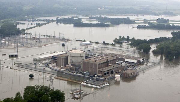 In this June 14, 2011 file photo, the Fort Calhoun nuclear power station, in Fort Calhoun, Neb., is surrounded by flood waters from the Missouri River - Sputnik International