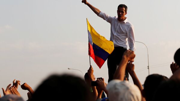 Venezuelan opposition leader Juan Guaido, who many nations have recognized as the country's rightful interim ruler, attends a rally in San Mateo Anzoategui, Venezuela March 22, 2019 - Sputnik International
