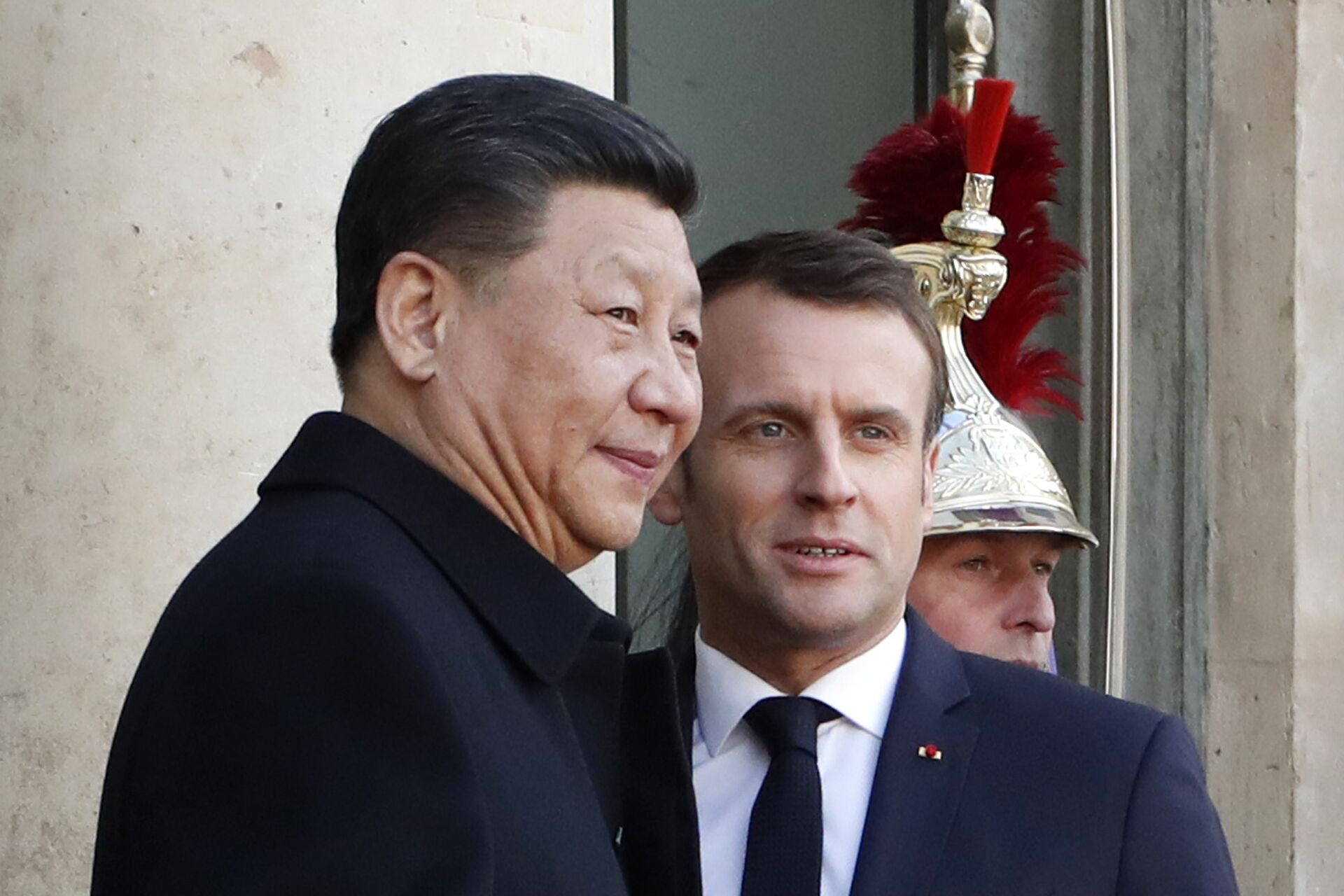 French President Emmanuel Macron, right, welcomes his Chinese counterpart Xi Jinping prior to a meeting at the Elysee Palace, in Paris, Monday, March 25, 2019. - Sputnik International, 1920, 13.10.2021