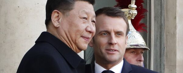 French President Emmanuel Macron, right, welcomes his Chinese counterpart Xi Jinping prior to a meeting at the Elysee Palace, in Paris, Monday, March 25, 2019. French President Emmanuel Macron, right, welcomes his Chinese counterpart Xi Jinping prior to a meeting at the Elysee Palace, in Paris, Monday, March 25, 2019. - Sputnik International