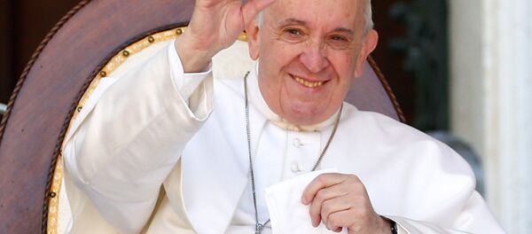 Pope Francis waves during a visit to the Shrine of Our Lady of Loreto on the feast of the Annunciation, in Loreto, Italy - Sputnik International