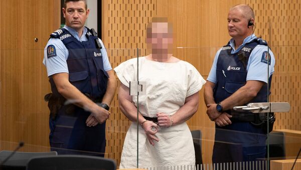 Brenton Tarrant, charged for murder, making a sign to the camera during his appearance in the Christchurch District Court, New Zealand March 16, 2019 - Sputnik International