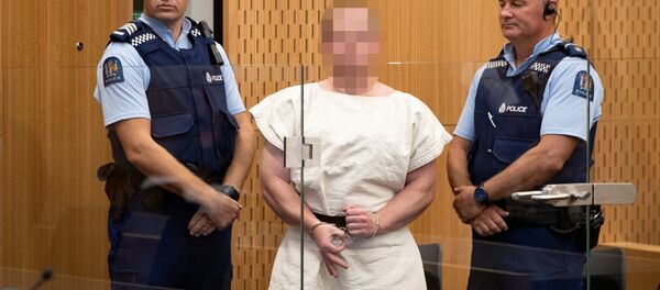 Brenton Tarrant, charged for murder, making a sign to the camera during his appearance in the Christchurch District Court, New Zealand March 16, 2019 Brenton Tarrant, charged for murder, making a sign to the camera during his appearance in the Christchurch District Court, New Zealand March 16, 2019 - Sputnik International