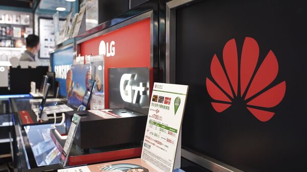 A logo of Huawei is displayed at a electronic retail shop in Hong Kong, 29 March 2019.  - Sputnik International