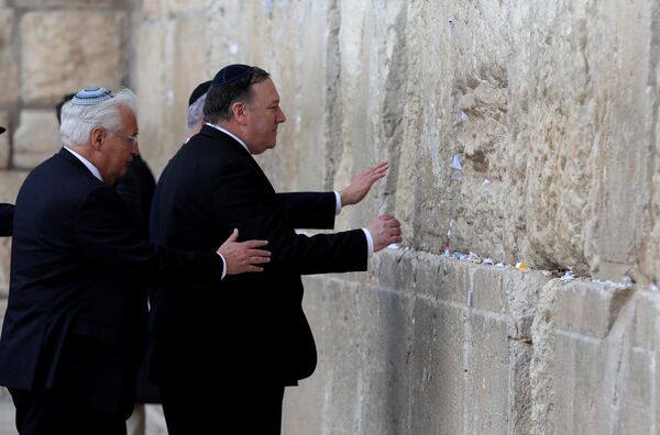 U.S. Secretary of State Mike Pompeo and U.S. Ambassador to Israel David Friedman touch the stones of the Western Wall during a visit to the site in Jerusalem's Old City March 21, 2019 U.S. Secretary of State Mike Pompeo and U.S. Ambassador to Israel David Friedman touch the stones of the Western Wall during a visit to the site in Jerusalem's Old City March 21, 2019 - Sputnik International