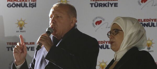 Turkey's President and ruling Justice and Development Party, or AKP, leader Recep Tayyip Erdogan, left, and his wife Emine, greet supporters after the results of the local elections were announced in Ankara, Turkey, early Monday, April 1, 2019. Turkey's President and ruling Justice and Development Party, or AKP, leader Recep Tayyip Erdogan, left, and his wife Emine, greet supporters after the results of the local elections were announced in Ankara, Turkey, early Monday, April 1, 2019. - Sputnik International