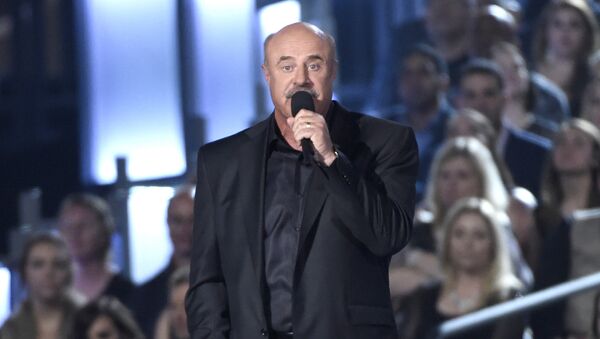 Dr. Phil McGraw speaks on stage at the 50th annual Academy of Country Music Awards at AT&T Stadium on Sunday, April 19, 2015, in Arlington, Texas. - Sputnik International